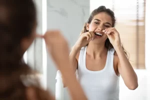 Why Do My Teeth Hurt After Flossing?