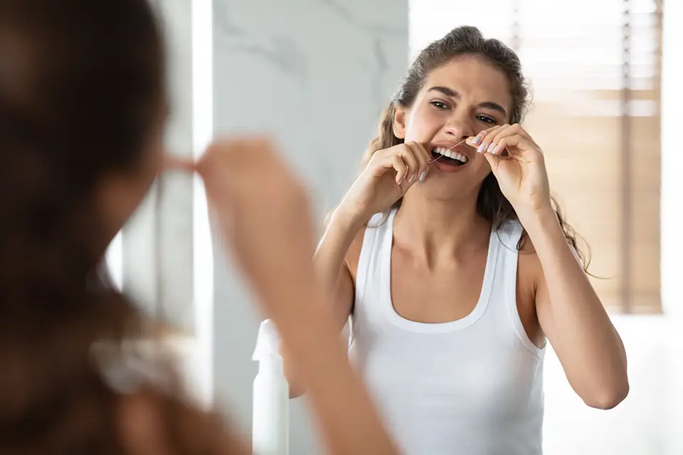 Why Do My Teeth Hurt After Flossing?
