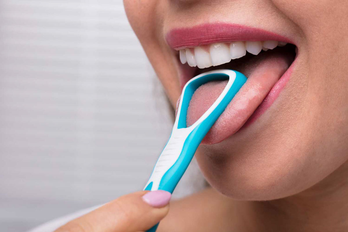 The Benefits of Tongue Scraping By Smile Dental in Toronto