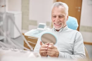 vSingle-Tooth Implants vs. Implant Bridges: Making the Right Choice for Your Smile