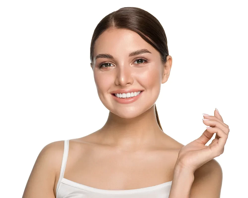 A woman smiling, showcasing Cosmetic Dentistry in Toronto