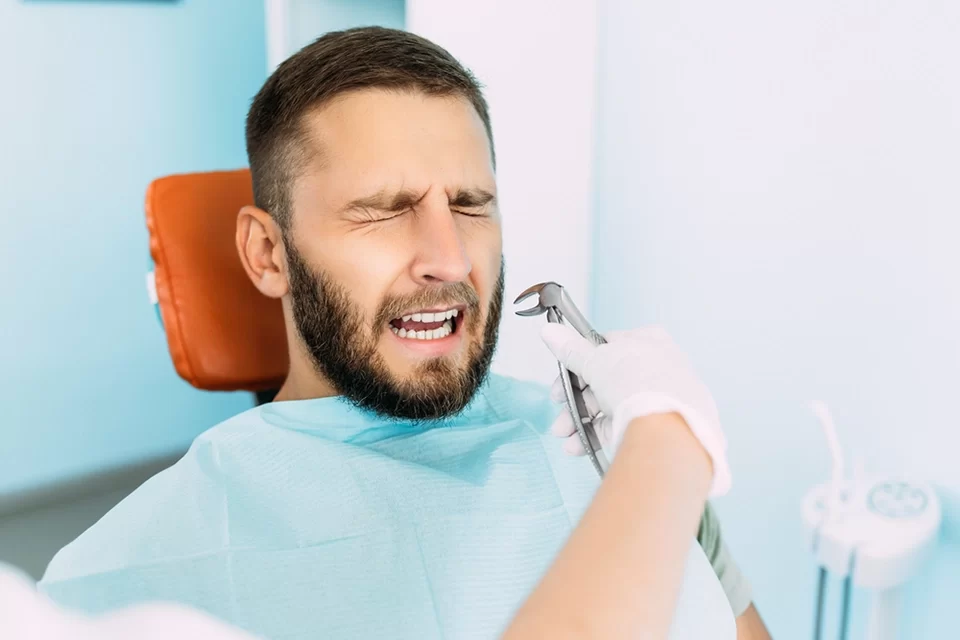 Extraction 1. Neglecting Proper Rest – Common Mistakes After Dental Extraction