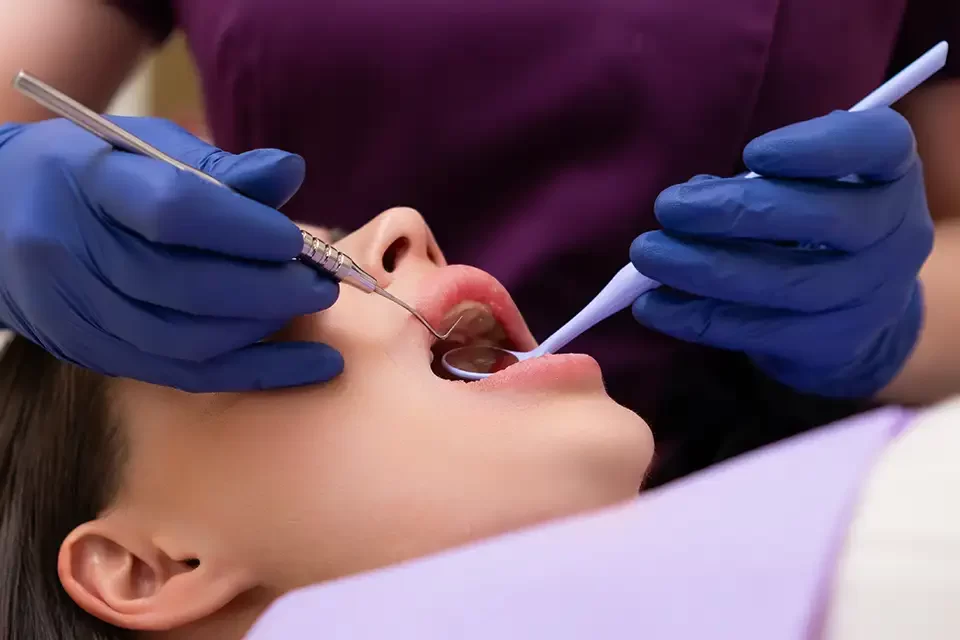 close-up-dentist-examining-teeth-of-patient Pulp Infection Treatment Options
